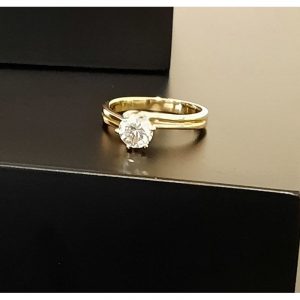 Bague solitaire et or jaune 18K